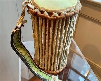$24 - Leather hand drum with strap; as is, strap is partly detached; 11" x 6"