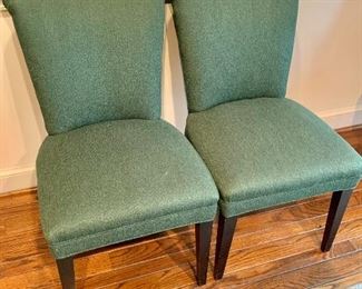 $75 each - Four green linen dining chairs; 34 in. H x 20 in. W x 27 in. deep, seat height 18 in.; no significant stains; minor staining and wear.