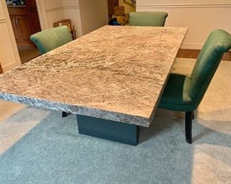 $595 - Granite top table on laminated wooden pedestal with chips and overall wear to bases of pedestal legs; 42 in. W x 79 1/2 in. L, 28 1/2 in. H; Movers will be needed