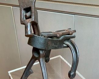$495 - John Stritch signed, iron sculpture "dog" - signed "Stritch;" 16 1/2 in. H x 14 in. W x 9 1/2 in. deep
