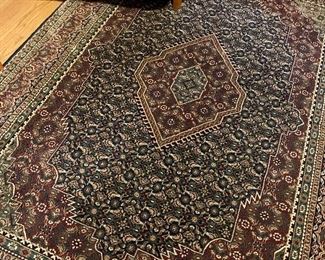 $75 - Royal Millennium machine made area rug; 7'7" x 5'3"
