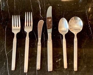 $80 - 77 total pieces Oneida Twilight silverplate flatware and serving utensils; 72 pieces of flatware (12 dinner knives, 12 butter knives, 12 salad forks, 12 dinner forks, 12 teaspoons, and 12 soup spoons) plus five service pieces