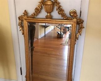 Gold framed wall mirror