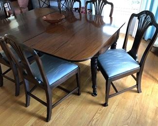 Antique dining room table, 6 chairs, leafs and pads.....
