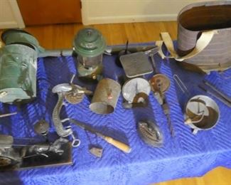 Various antiques including some antique farm equipment (Duster, and seed spreader)