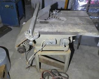 Old belt drive chain saw. 
