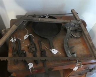Iron siillet, antique saw, cherry pitter, drawing knives