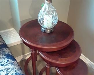 Bombay Company nesting tables and glass pineapple candle holder.