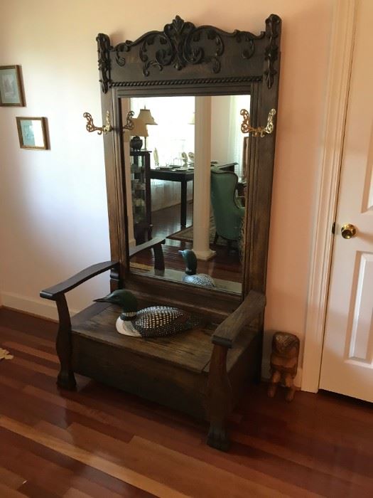 Antique hall tree with hat racks, mirror, and seat   Large hand carved and  signed Common Loon by Jim Lascoff  