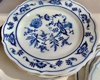 $30  - Set of 4 blue and white plates.  Each: 7"Diam