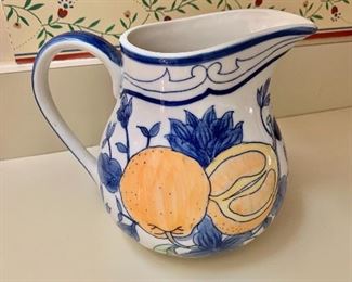$25 Blue and white pitcher with lemon and cherry  design.  7"H; 7"W; 6"Diam  
