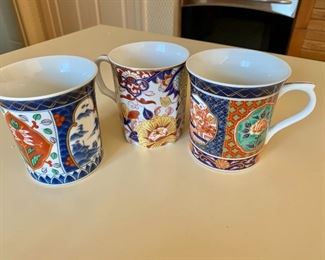 $18 - Set of 3 mugs.  Each about:  3.5"H; 3"Diam