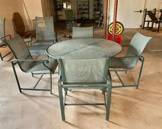 $625  - Vintage Brown Jordan patio table with 4 chairs. Table: 28" H, 49" diam.  Chairs: 36" H, 26" W, 24" D, seat height 17.5".