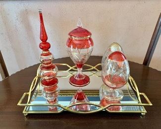$95 - Set of  glass decor on tray.  Tray 18" L x 11.75" W.  Tallest item on left 13" H, 4" diam.  Ovoid item on right 7.5" H, 4" diam.