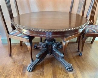 $395 - Vintage pedestal table with claw feet and rope edge detail- 41" diam, 28.5" H. 