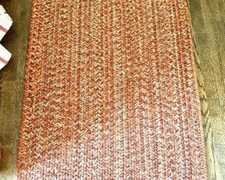$65 - Small rag rug  46" L x 29" W. 