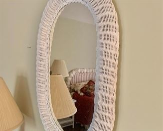 $50 - Oval wicker mirror - 28.5" H x 20" W. 