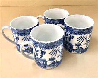 $32 Set of 4 blue and white blue willow mugs approx 4" H and 3.25" diameter 