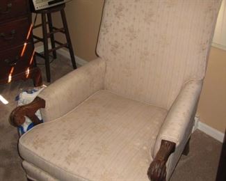 Antique cream upholstered chair and ottoman