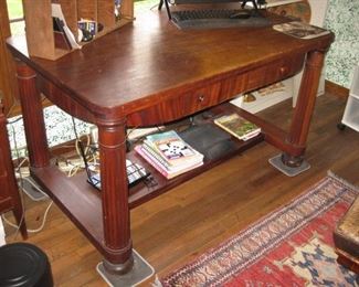 Antique flame mahogany library table
