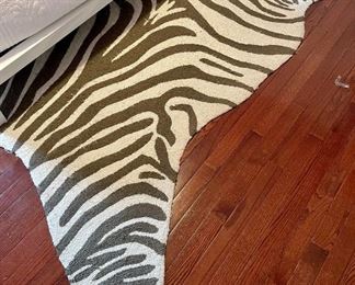 Item 48:  Zebra Rug - 98" x 49.5" (this item shows signs of wear):  $28