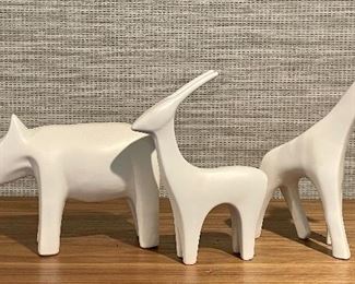 Item 76:  Ceramic Rhino (left) - 10" x 6":    SOLD                                                         Item 77:  Ceramic Antelope (middle) - 6" x 8":  $22                                                                             Item 78:  Ceramic Giraffe (right) - 5" x 10": SOLD