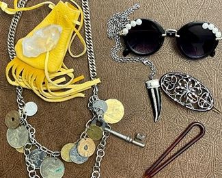 Item 182:  Lot 8 Costume Jewelry - quartz rock in yellow bag, barrettes, coin necklace, glasses and pendant: $14