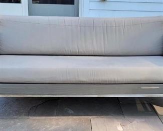 Item 186:  Crate and Barrel Outdoor Furniture -Synthetic Mesh, Small Weave - Dune Taupe Bench Seat Sofa with Chrome Base and Sunbrella Fabric - 69”l x 21.5”w x 24”h:  $655