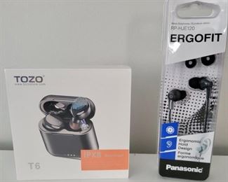 Item 249:  Tozo Earbuds (left - new in box!):  $15                                                                                          Item 250:  Panasonic Ergofit Earbuds (right - new in box!):  $12