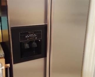 Side-by-side stainless steel refrigerator freezer $250