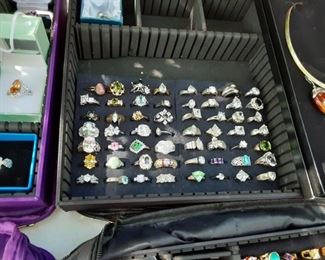 Over 200 costume jewelry rings mostly size 7. But there are a few 7 1/2 + 8