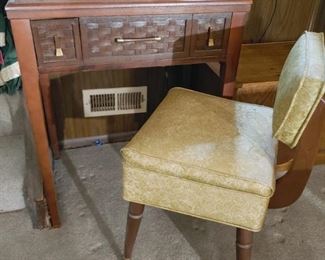 Sewing table with sewing machine inside, and sewing chair with storage in the seat