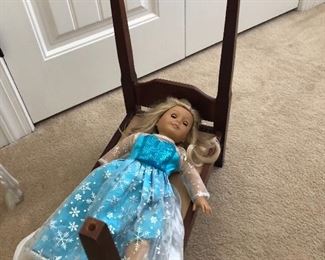 Doll not included with bed, but picture just to show size of bed with American Girl doll in it. 