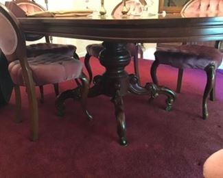 Oval formal dining table with single pedestal 