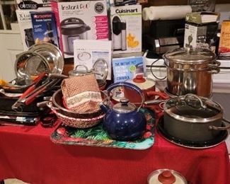 An assortment of pots and small appliances (new)