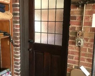 Door Leading From Garage To The Covered Patio