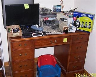 Small desk, computer, etc..