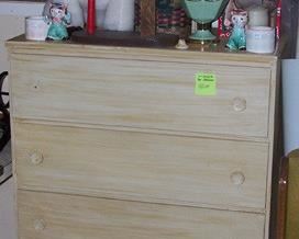 Antiqued high boy dresser, Large stuffed Spuds McKenzie, etc...