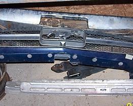 Mustang parts including  grill, bumper and console