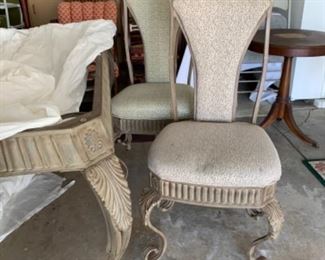 Upholstered iron with glass top dining set