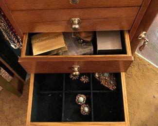 Different jewelry items in the drawer 