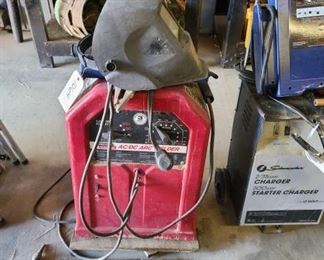 1064	

Lincoln Electric AC/DC Arc Welder, Welding Mask, And Torch End
Lincoln Electric AC/DC Arc Welder, Welding Mask, And Torch End