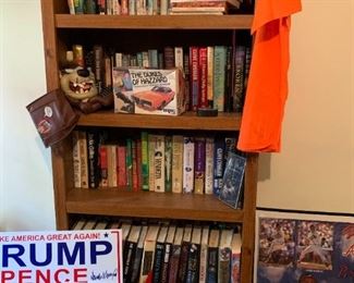 lots of books and some Trump political advertisement 