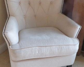 One of two occasional chairs