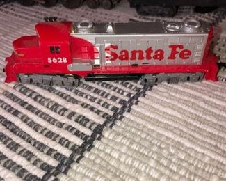 I believe this Santa Fe engine to be HO scale