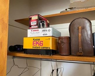 vintage cameras and binoculars