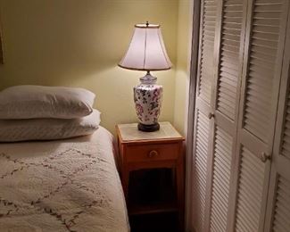 One nightstand in the spare bedroom