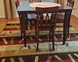 dining room table and four chairs