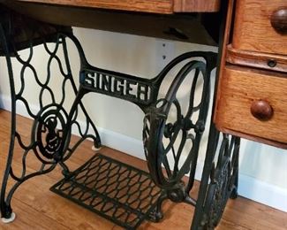 very old Singer sewing machine table, must be seen and then bought