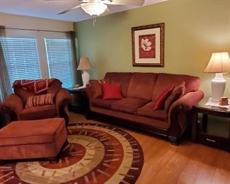 living room sofa and matching chair with ottoman